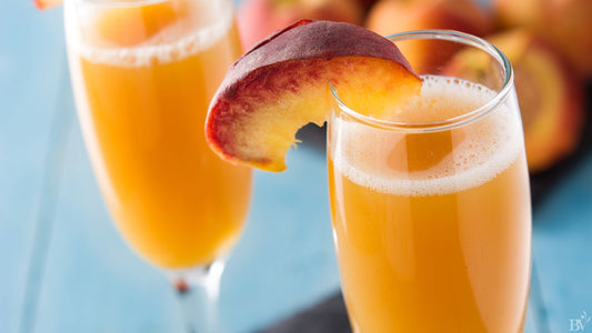 Two glasses of peach balsamic bellini